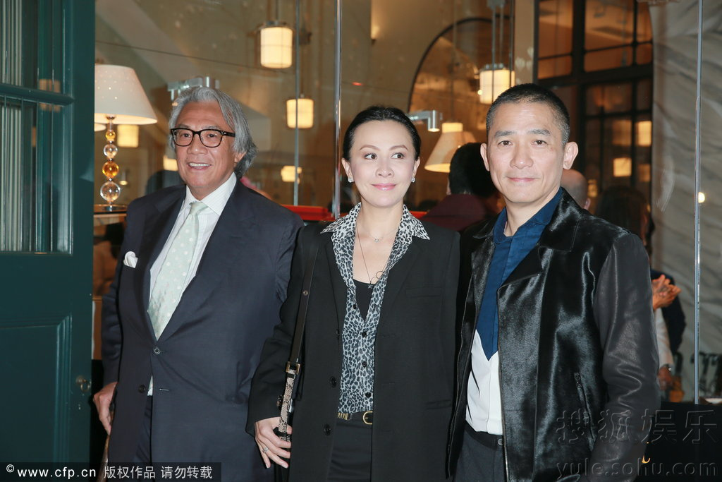 梁朝伟和刘嘉玲返回香港 Img6340479_f.jpg