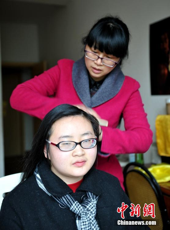 【图片故事】脑瘫女孩的大学梦