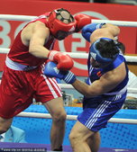 2010年11月25日，广州，2010亚运会拳击男子91公斤以上级，张志磊7-5伊万-季奇科，夺得冠...